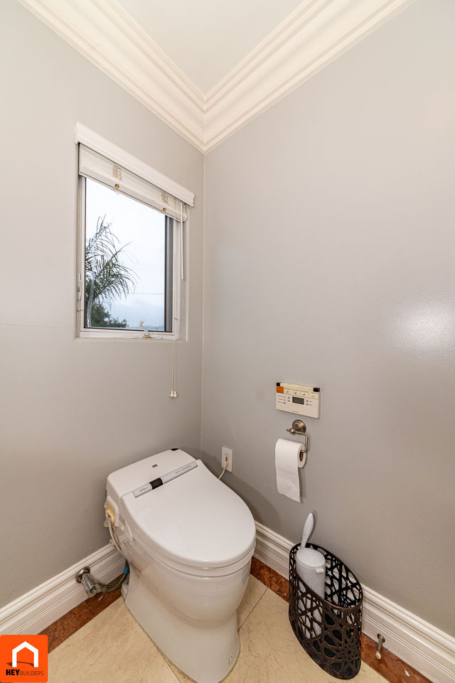 Powder room before renovation - small toilet closet